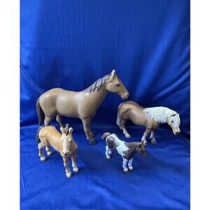 Collection of Four Small Horse Resin Figurines
